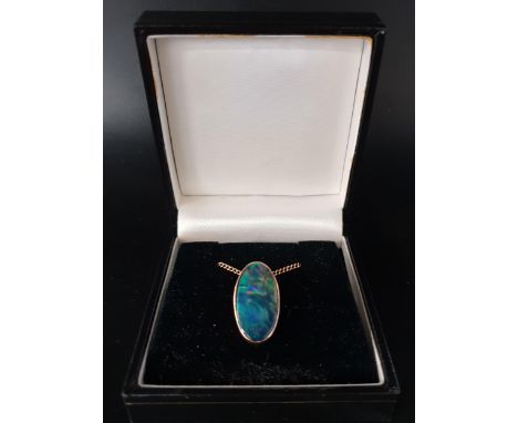 OPAL SET PENDANTin nine carat gold mount and on unmarked gold chain, the pendant approximately 2cm high 