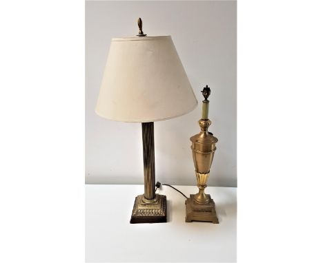 BRASS CORINTHIAN COLUMN TABLE LAMPraised on a square base with a cream circular shade, 76cm high, together with a brass urn s