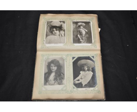 An early 20th Century album of mainly portrait postcards, approximately 110 postcards, in an album.