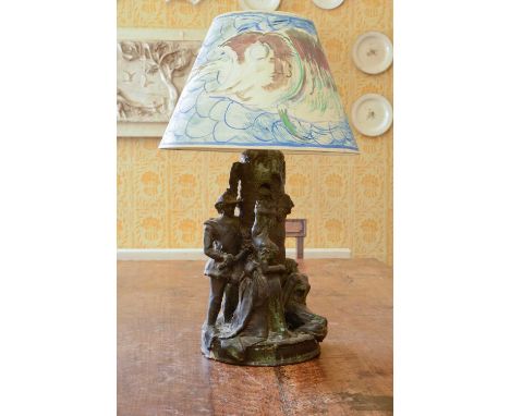 Quentin Bell (1910-1996),a glazed earthenware table lamp, in the form of a mythical scene with a man being punished by being 