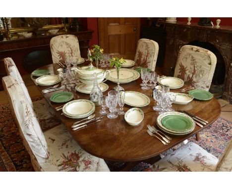 A large Reilly creamware part dinner service,18th century, each piece painted with a continuous band of leaves and berries,to