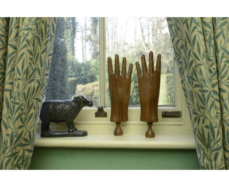 A pair of carved beech glovemaker's lasts,19th century, French, 32cm high approximately (2)Condition report: Reasonable condi