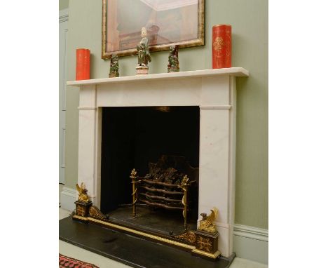 A French Empire bronze and gilt-bronze fire kerb,second quarter of the 19th century, the back supports to either end with gri