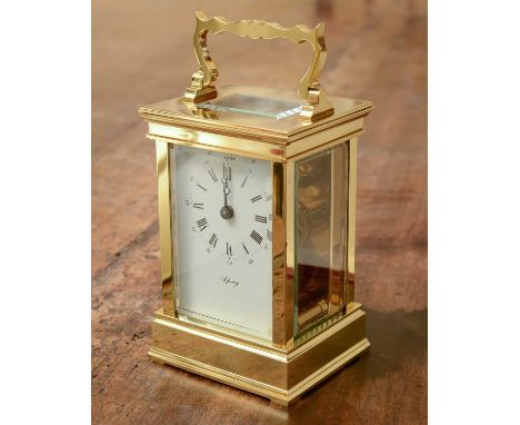 A brass carriage clock,20th century, by Asprey &amp; Co, the white dial with black Roman numerals, engraved to the reverse,16