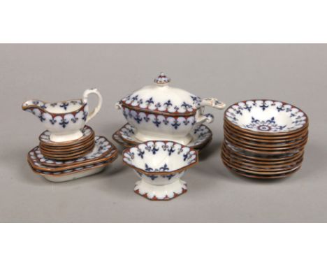 A mid 19th century 25 piece child's pottery toy ware dinner service attributed to Davenport. Printed and enamelled with red, 
