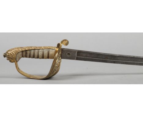 A Royal Navy Officers dress sword. With etched fullered blade bearing proof mark and signed Wilkinson, London. Having brass h