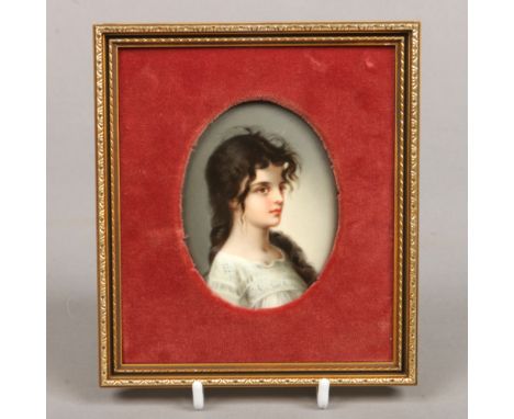 A 19th century KPM style portrait miniature. Depicting a young girl in a night dress. Unmarked, 9.75cm x 7.25cm.&nbsp;Conditi