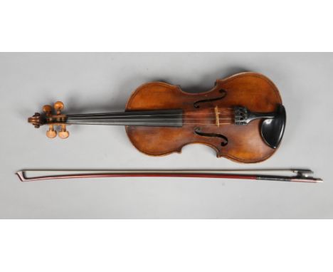 A cased German viola and bow. Label for Giovan Paolo Magini, 36.75cm.Condition report intended as a guide only.Joint opening 