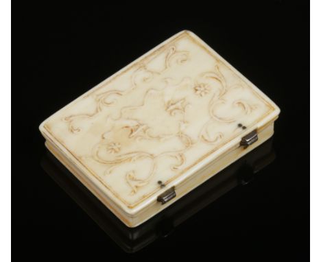 A 19th century carved ivory snuff box with hinged cover. Carved in light relief with a pair of birds and scrolls, 6.75cm wide