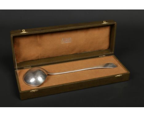 A boxed French silver soup ladle by Christofle. With engraved cipher to the terminal, Minerva punch mark to the bowl, 218 gra