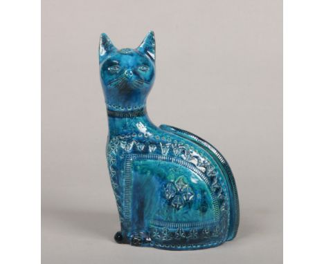 A Bitossi Italian studio pottery stylized model of a seated cat. Turquoise glazed and having incised and punched decorations.