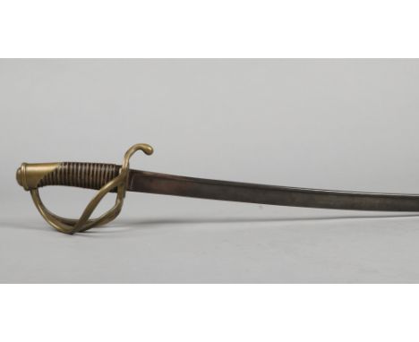 A French Cavalry Officers sword. With pipe back blade and brass openwork guard stamped 29743, c.1840 blade length 92cm.Condit