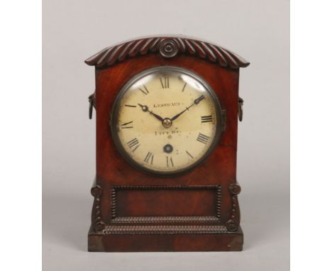 An Irish Regency mahogany cased 8 day fusee bracket clock by Joseph Lessware, Dublin. With carved gadrooned and bobbin turned