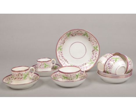 An early 19th century Sunderland lustre part tea and coffee service. Each piece painted with a trailing band of leaves and be