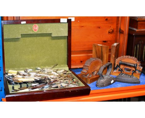 CANTEEN WITH VARIOUS CUTLERY, WHITE METAL LADLE ETC, PAIR OF NOVELTY WOODEN BOOKENDS &amp; 2 OLD IRONS     