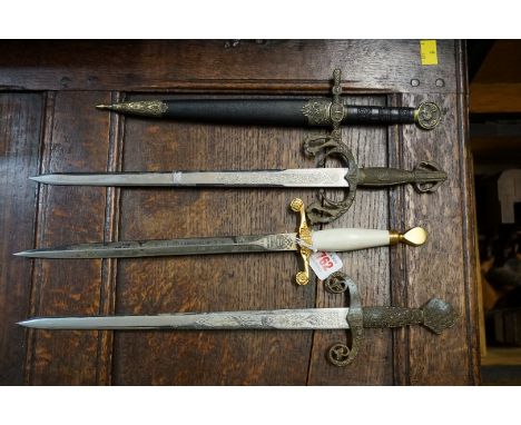 A Channel Islands Liberation commemorative dagger, by Wilkinson; together with three others. 