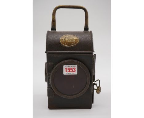 Railwayana: a steel lantern, with brass plaque inscribed 'GR, 12-1939, SNLW Ltd', 24cm high.&nbsp; 