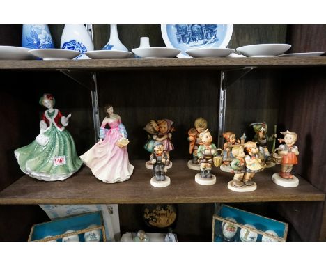 Eight Hummel figures; together with two Royal Doulton figures.&nbsp; 