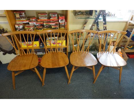 A set of four Ercol blonde 376 'Lattice Candlestick' dining chairs.&nbsp; &nbsp; 