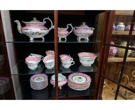A Victorian porcelain part tea service, painted with flowers on a pink ground. 
