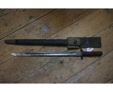 A 1907 Pattern bayonet and leather scabbard, made in 1917 by Lithgow, with canvas belt frog. 