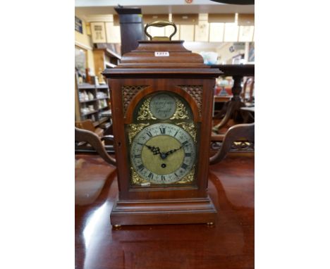 An 18th century style mahogany bracket timepiece, with single fusee, with pendulum, key and wooden bracket, 51cm high.