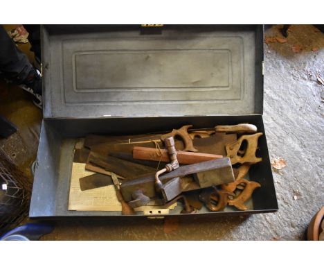A quantity of old tools in tin trunk.&nbsp; 