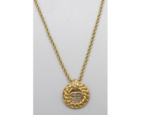 A Christian Dior necklace, chain a/f, pendant 2cm and attached to chain