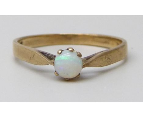 A 9ct gold and opal solitaire ring, 1.4g, M