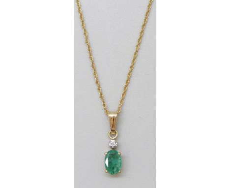 A 9ct gold, emerald and diamond pendant and chain, 1.2g, 1.4cm pendant (emerald as found)