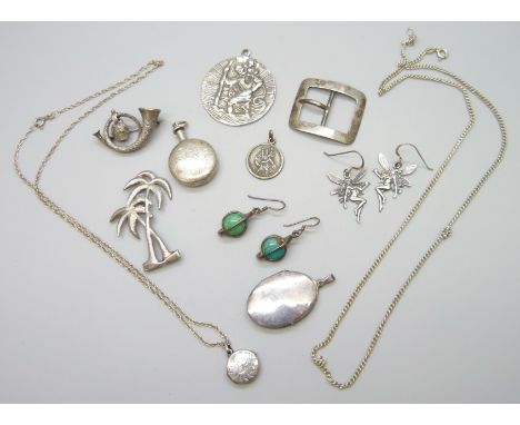 A collection of silver jewellery including a small George Jensen locket, brooches, a buckle, etc., 62g total