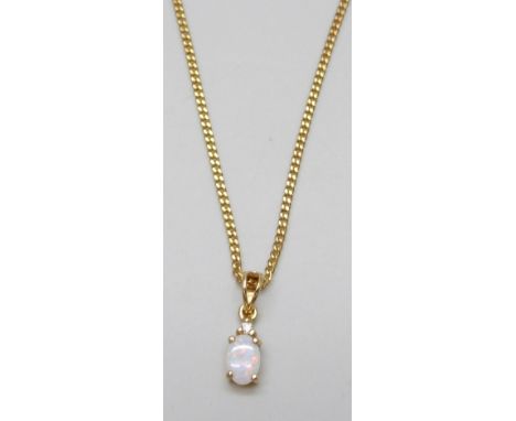 A 14ct gold set opal pendant, 0.4g, 1.4cm, on a plated chain