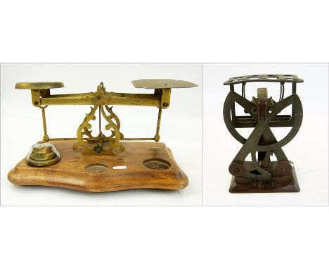Pair brass postal scales with three graduated weights and shaped stand and a set of tinplate postal scales (2) 