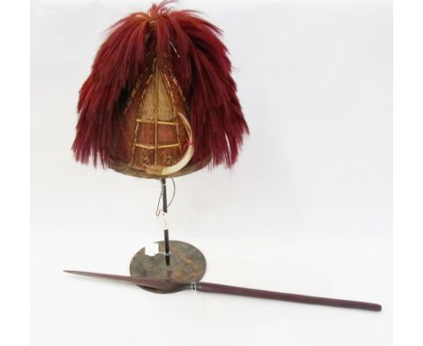 Naga tribal helmet and wooden spear 