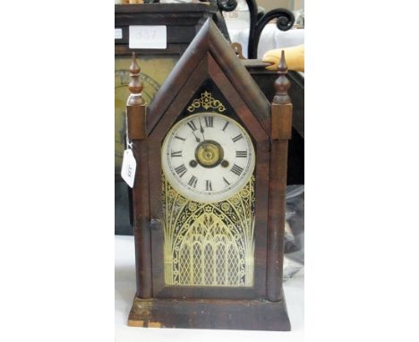 Stained wood mantel clock in pointed case, inscribed and labelled to the interior "Small sharp gothic" one-day timepiece havi