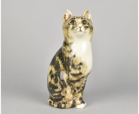 A Winstanley Cat with Glass Eye, 21cm high