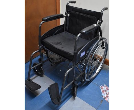 A Folding Wheelchair