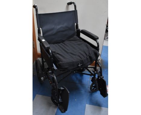 A Folding Wheelchair