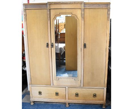 A Mid 20th Century Oak Triple Mirror Fronted Wardrobe with Two Base Drawers, (Matches Lots 498 &amp; 497)