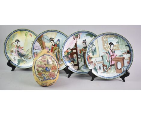 A Set of Four "Imperial Jingdezhen" Decorated Plates with Stands together with a Ceramic Decorated Egg