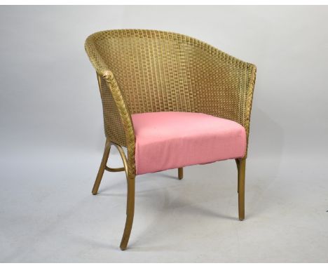 A Gilt Lloyd Loom Tub Armchair