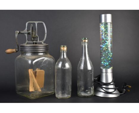 A Vintage Blow Butter Churn, Two Glass Bottles and a Glitter Lamp