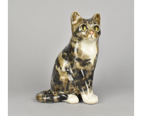 A Winstanley Cat with Glass Eye, 21.5cm high