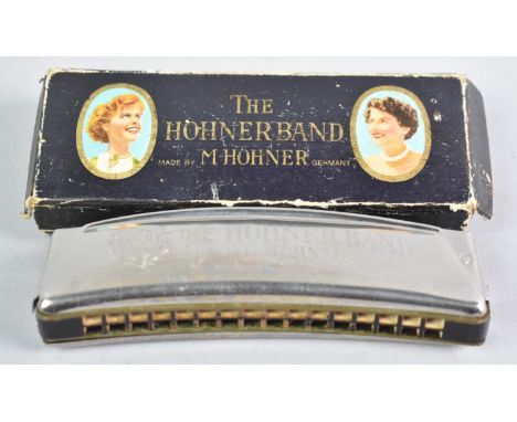 A Hohner Band Harmonica in Original Cardboard Box