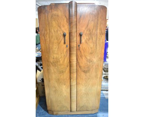 An Art Deco Walnut Fitted Double Wardrobe, 93cm Wide, with Metal Torch Handles