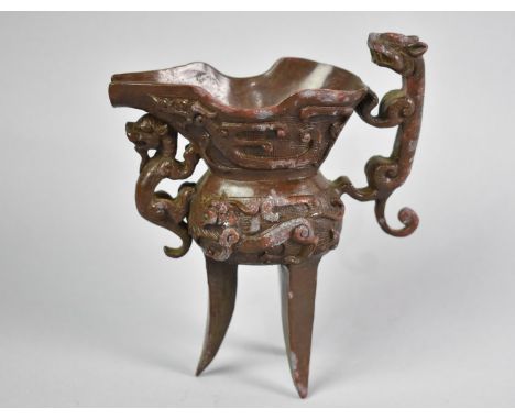 A Reproduction Chinese Patinated Bronze Three Legged Libation Ewer, 13.5cm High