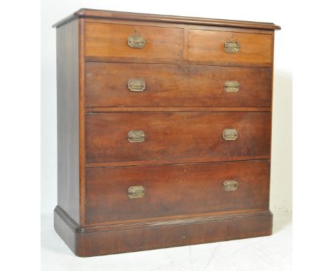 A 19th century Victorian walnut chest of drawers. The chest being raised on a plinth base with 2 short drawers over 3 deep dr