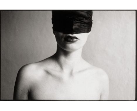 Marquardt, Sven -- Blindfolded woman. 1989. Vintage gelatin silver print. 21 x 30,5 cm. Photographer's stamp and dated in pen