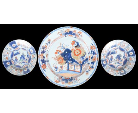 Chinese Imari charger and two plates18th centuryThe charger with floral motif and gilt details (D 38 cm); the two plates deco