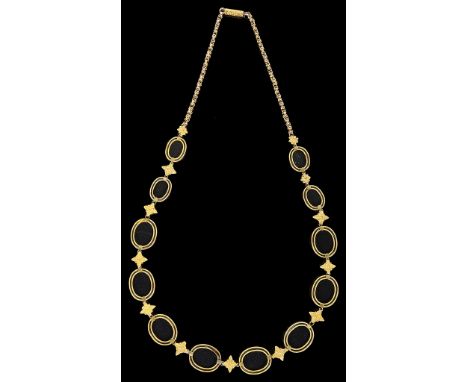 A Late 19th Century Elephant Hair Necklace:The twelve graduated annulets each set with elephant hair to the centres, on un-ha